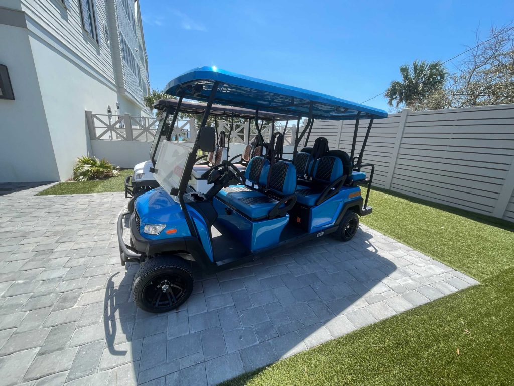 Two golf cart rentals viewed from the side.